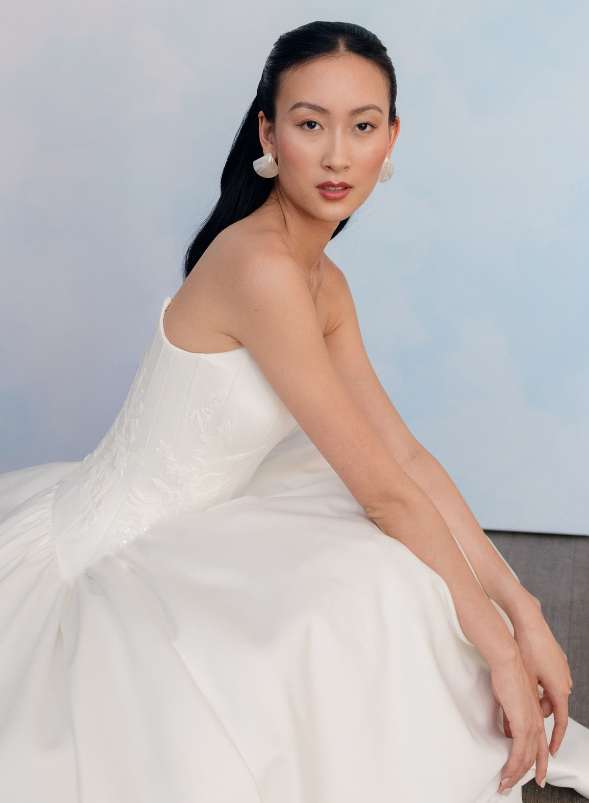 Dramatic drop waist, double face satin ballgown with placed lace and lace up back detail.