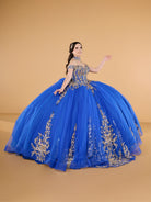 This ball gown features an ornate bodice with detailed embroidery and off-the-shoulder straps. The full tulle skirt is embellished with matching floral designs and finished with a dramatic bow and sweeping train.