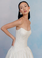 Dramatic drop waist, double face satin ballgown with placed lace and lace up back detail.