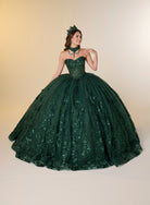 A woman modeling a strapless dark green ball gown with a sweetheart neckline, heavily embellished bodice, and a voluminous tulle skirt with floral lace and sequin details, against a warm beige studio background. / A strapless sweetheart ball gown featuring a fully beaded corset bodice, a lace-up back, and a voluminous tulle skirt layered with shimmering sequin floral details and an oversized back bow, paired with a matching beaded choker necklace.