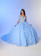 A woman wearing a voluminous light blue off-the-shoulder ball gown with floral embroidery and a matching tiara, posed against a soft blue-to-white studio backdrop. / Luxurious off-the-shoulder ball gown with intricate detailing and a statement bow at the back.